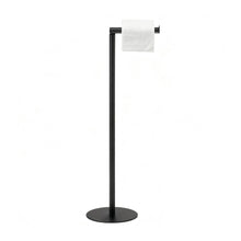 Free-standing black toilet paper holder stand with a top bar holding one roll
