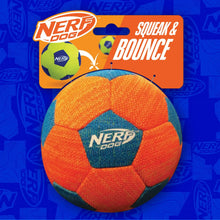 Orange and blue Nerf Dog squeak soccer ball on retail blister card.