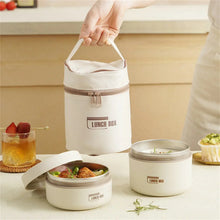 White insulated food containers with carrying handle, lids open, and “LUNCH BOX” labels