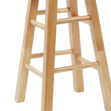 Natural wood backless bar stool close-up: ladder-style side rails and rungs