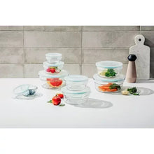 Glass food storage set with round containers and snap lids, assorted sizes