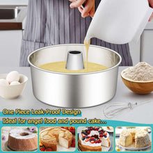 Stainless steel tube cake pan with batter being poured into the center tube