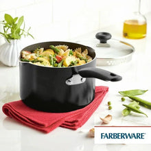 Black nonstick saucepan with pouring spout, straining lid, and side handle