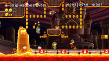 Platform game scene with Mario running through a glowing castle stage at night