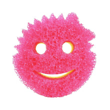 Pink smile-shaped cleaning sponge with two eye holes and curved mouth