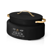 Electric multi-cooker with lid, black body, gold handle, front control panel
