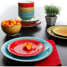 Festival dinnerware set with multicolor striped plates and bowls, assorted colors