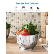 Stainless steel colander with loop handles and perforated basket for rinsing