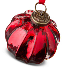 Red ribbed glass ball ornament with red ribbon and bronze looped cap
