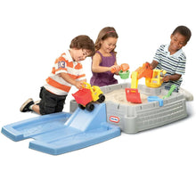 Digger sandbox playset with blue ramp and gray base, kids playing with trucks