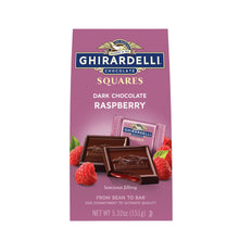 Dark chocolate raspberry squares bag with foil-wrapped bar and chocolate squares