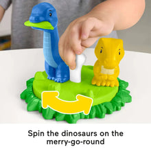 Dinosaur merry-go-round toy with green base and blue and yellow dinosaur figures