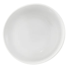 Round white porcelain serving bowl with smooth concave interior