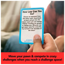 Blue “How Low Can You Go?” challenge card held in a hand