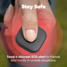 Black Bluetooth tracker with alert ring icons around the button under a fingertip
