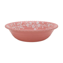 Pink melamine bowl with white floral band and scalloped rim