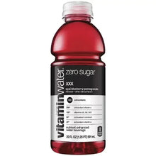 Zero sugar water bottle labeled XXX, blueberry-pomegranate flavored, with vitamin facts panel