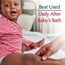 Caregiver applying lotion to baby’s arm with drop on skin