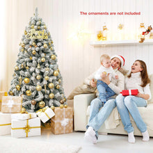 Snow flocked artificial Christmas tree with gold ornaments on a hinged stand, 6 ft