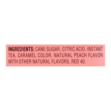 Ingredients label: cane sugar, citric acid, instant tea, caramel color, natural peach flavor