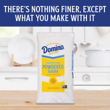 Powdered sugar bag on kitchen counter with measuring bowl and spoon