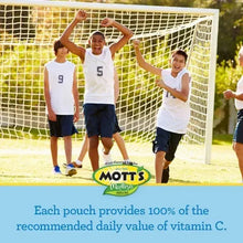 Mott's fruit flavored snack pouches at outdoor soccer goal with kids celebrating