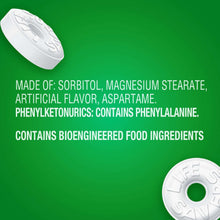 Sugar-free mint hard candy discs with green center on a green pouch back