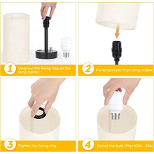 Bedside table lamp showing shade attachment and bulb installation