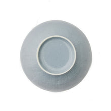 Denim blue stoneware cereal bowl bottom view with centered circular base