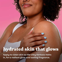 Woman applying jasmine peach body lotion to her chest with blue nails