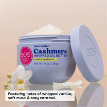 Body butter jar with pale blue lid, creamy whipped swirl on top