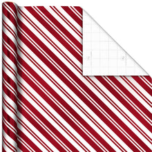 Hallmark candy cane stripe gift wrap sheet with gridded cutting guide on the reverse