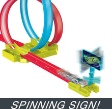 Laser stunt track section with blue and red loops, yellow base and spinning lane