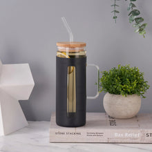 Black glass tumbler with bamboo lid, black silicone sleeve, and side handle