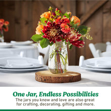 Regular-mouth mason jar with metal lid and ring, used as a vase with flowers