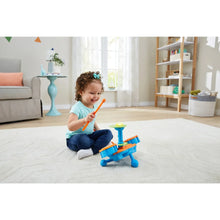 Kids drum set with orange frame, yellow center drum, and two blue mallets