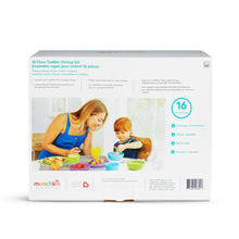 Munchkin 16-piece toddler dining set box with product scene and colorful tableware.