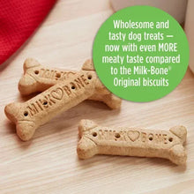 Two bone-shaped dog biscuits on a light surface with embossed treat text