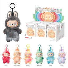 Black vinyl plush keychain with cartoon face and loop ring; blind box lineup