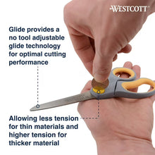 Grey and yellow Westcott scissors with adjustable glide tension knob detail