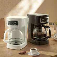 Black and white programmable drip coffee makers with glass carafes