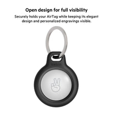 Black AirTag holder case with key ring and visible engraved face