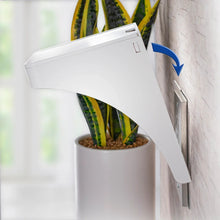 White wall outlet shelf with hinged cover and cord storage compartment