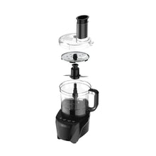 Food processor with stacked components: clear bowl, lid, blade, and slicing disc