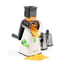 Manual rotary grater and slicer with drum attachment, white base, green handle, shredded food