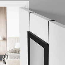 Rectangular over-the-door mirror with black frame, viewed from the side