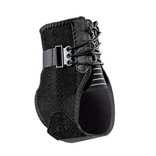 Black ankle brace close-up with hook-and-loop strap and lace-up front