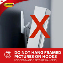 Slate terrace hook shown with a warning symbol, do not hang framed pictures