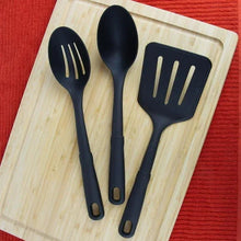 Black nylon kitchen utensil set with three heads: slotted spatula, slotted spoon, solid spoon