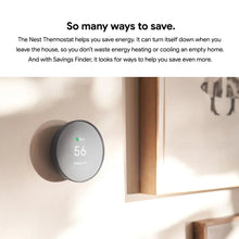 Wall-mounted smart thermostat with 56 display on interior wall
